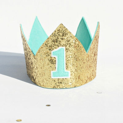 kids birthday crown in gold glitter with a mint colour felt 1 on the front