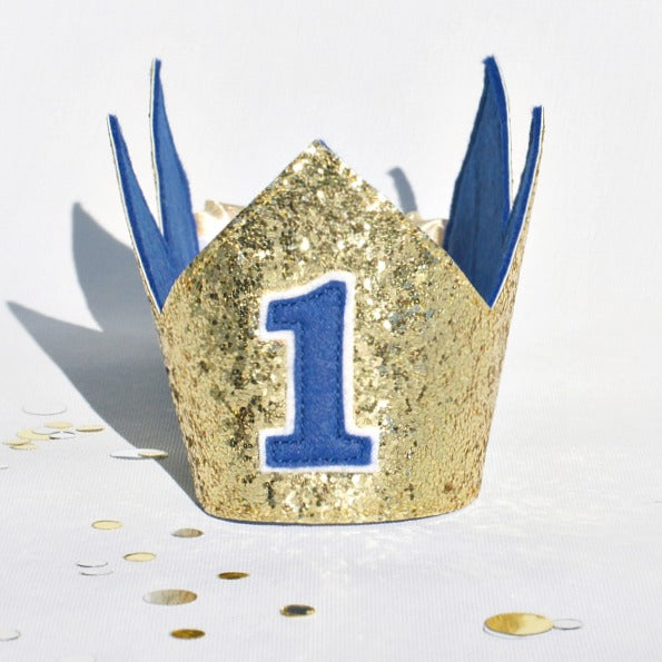first birthday gold crown with royal blue felt backing and the number 1 on the front